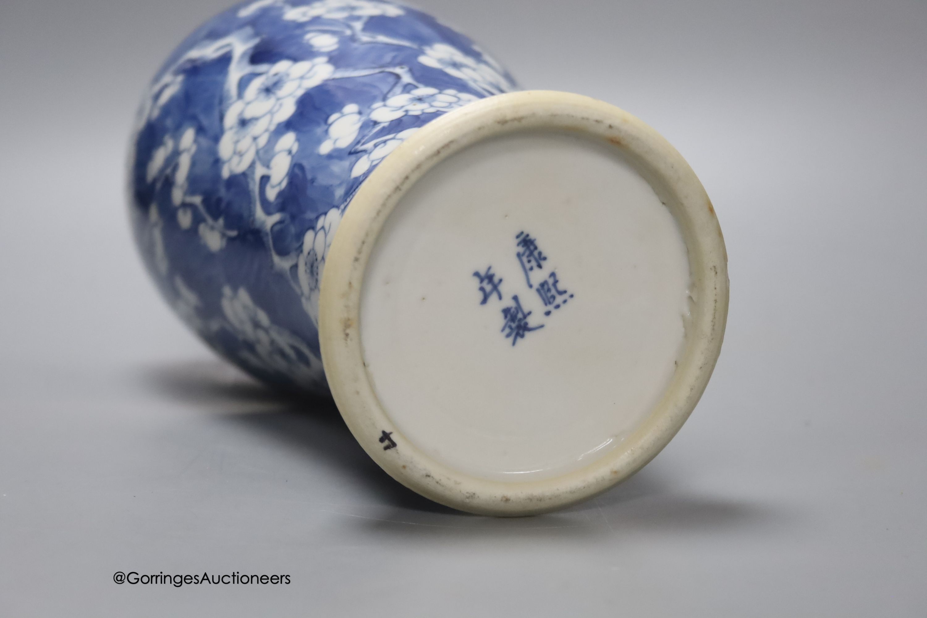 A 19th century Chinese blue and white 'prunus' vase and cover, height 33cm